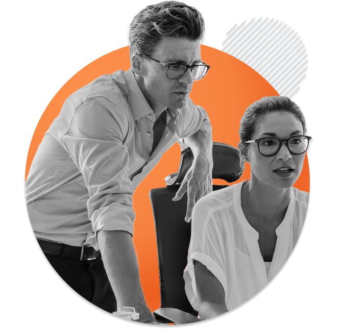 Two people working together on a project black and white cutout against orange circle | Catalyst Marketing Agency